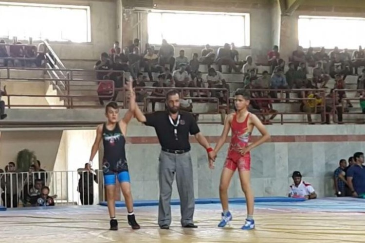 كشتي گير پاوه اي، مقام اول مسابقات کشتی ازاد قهرمانی استان را كسب كرد