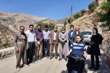 اهدای یک دستگاه تمام اتوماتیک ویلچر برقی به یک معلول جسمی در باینگان 