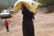 توزیع آرد در مناطق محروم بخش باینگان